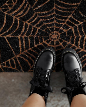 Botas con plataforma Molly en piel en Negro | Dr. Martens